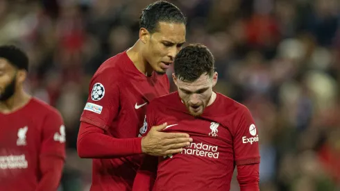 Van Dijk e Andy Robertson em jogo contra o Real Madrid.