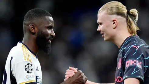 MADRID, SPAIN – APRIL 09: Antonio Ruediger of Real Madrid and Erling Haaland of Manchester City shake hands after the draw in the UEFA Champions League quarter-final first leg match between Real Madrid CF and Manchester City at Estadio Santiago Bernabeu on April 09, 2024 in Madrid, Spain. (Photo by Angel Martinez/Getty Images)