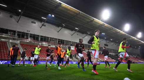 Atletas do United em treino (Photo by Ben Roberts Photo/Getty Images)