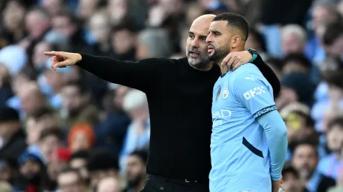 Kyle Walker junto com Pep Guardiola