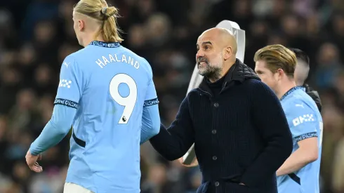 Guardiola e Haaland em campo (Photo by Michael Regan/Getty Images)