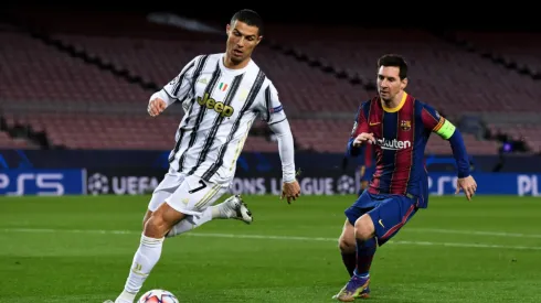 Messi e Cristiano Ronaldo. David Ramos/Getty Images.