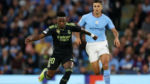 Vinicius Júnior e Rodri em confronto de Champions League