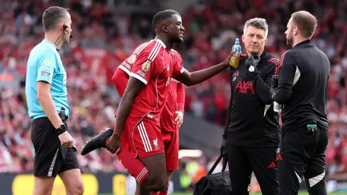 LIVERPOOL, ENGLAND – AUGUST 31: Ibrahima Konate of Liverpool reacts with an injury before being substituted off during the Premier League match between Liverpool and Arsenal at Anfield on August 31, 2025 in Liverpool, England. (Photo by Alex Pantling/Getty Images)