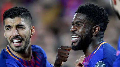 Samuel Umtiti com Luis Suárez pelo Barcelona (Foto: Stuart Franklin/Getty Images)