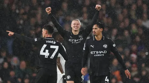 Haaland comemora seu 100º gol na Premier League. Alex Pantling/Getty Images