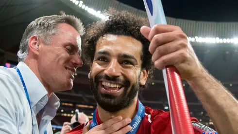 Carragher e Salah a celebrarem a Champions League juntos, em 2019. Foto: Imago