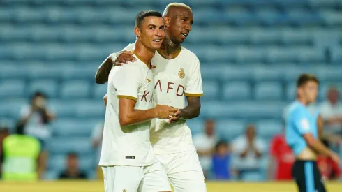 Anderson Talisca com Cristino Ronaldo. Foto: Yasser Bakhsh/Getty Images