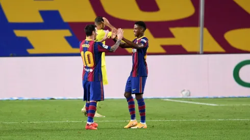 Messi e Ansu Fati em jogo do Barcelona, em 2020. Foto: David Ramos/Getty Images