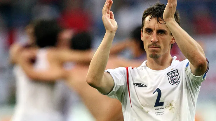 Gelsenkirchen, GERMANY: English defender Gary Neville acknowledges the applause at the end of the World Cup 2006 quarter-final football game England vs. Portugal, 01 July 2006 at Gelsenkirchen stadium. Portugal won 3-1 on penalties. AFP PHOTO / DDP / VOLKER HARTMANN (Photo credit should read VOLKER HARTMANN/AFP/Getty Images)

