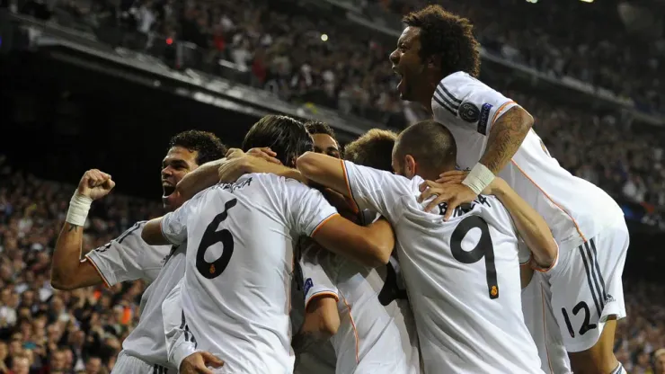 Real Madrid's players celebrate their first score the UEFA Champions League Group B football match Real Madrid CF vs Juventus at the Santiago Bernabeu stadium in Madrid on October 23, 2013. AFP PHOTO / JAVIER SORIANO (Photo credit should read JAVIER SORIANO/AFP/Getty Images)
