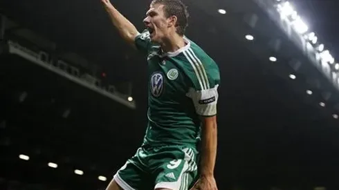 It's A Clear Red: Podolski Kicks Dzeko