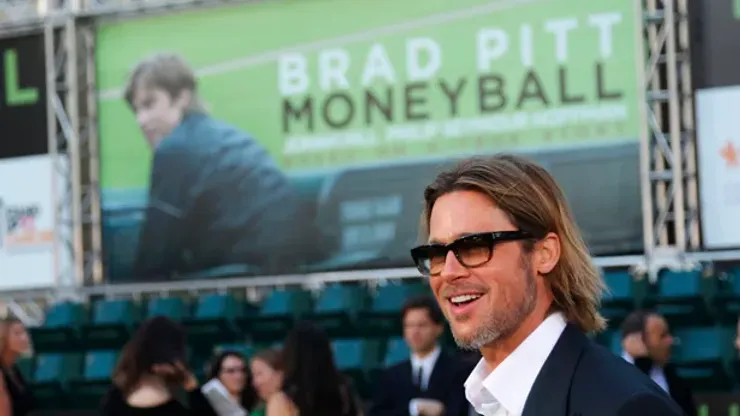 U.S. actor Brad Pitt, who stars as Oakland Athletics' general manager Billy Beane, arrives for the world premiere of the film "Moneyball" in Oakland, California September 19, 2011. REUTERS/Robert Galbraith (UNITED STATES – Tags: ENTERTAINMENT SPORT BASEBALL)
