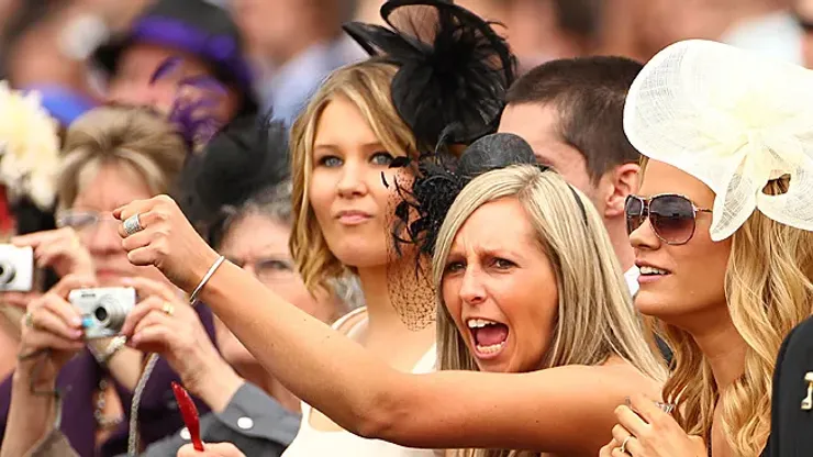 MELBOURNE, AUSTRALIA – NOVEMBER 02: A spectator cheers during race four The Herald Sun Stakes during Melbourne Cup Day at Flemington Racecourse on November 2, 2010 in Melbourne, Australia. (Photo by Robert Cianflone/Getty Images)
