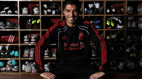 Liverpool Striker Luis Suarez Bites Branislav Ivanovic