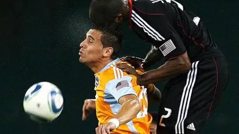 Julius James #2 of D.C. United climbs on the back of Geoff Cameron #20 of the Houston Dynamo during an MLS match at RFK Stadium in Washington D.C. on September 25 2010. Houston won 3-1.