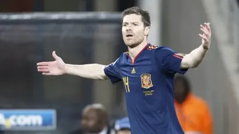 Spain's midfielder Xabi Alonso reacts during the 2010 FIFA football World Cup final between the Netherlands and Spain on July 11, 2010 at Soccer City stadium in Soweto, suburban Johannesburg. NO PUSH TO MOBILE / MOBILE USE SOLELY WITHIN EDITORIAL ARTICLE - AFP PHOTO / THOMAS COEX (Photo credit should read THOMAS COEX/AFP/Getty Images)