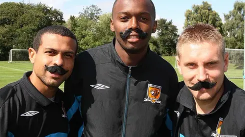Hull City's Andy Dawson (right).