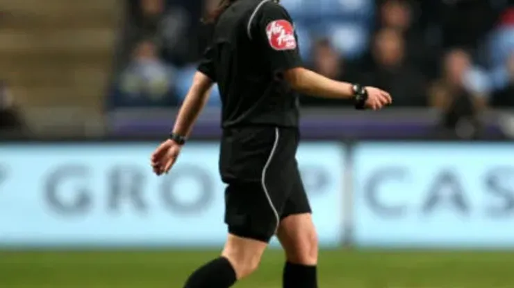 Female referee Amy Fearn comes on to take over from original referee Anthony Bates after he pulled a muscle in his leg
