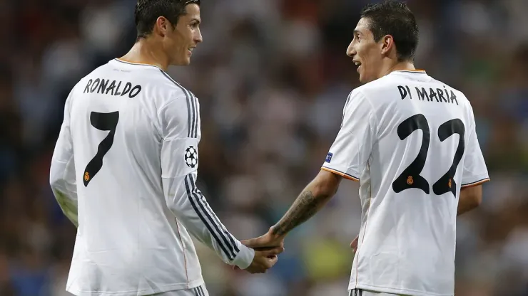 Real's Angel Di Maria, right is congratulated by Real's Cristiano Ronaldo after he scored during the Champions League group B soccer match between Real Madrid and FC Copenhagen at the Santiago Bernabeu stadium in Madrid, Wednesday, Oct. 2, 2013. (AP Photo/Daniel Ochoa de Olza)
