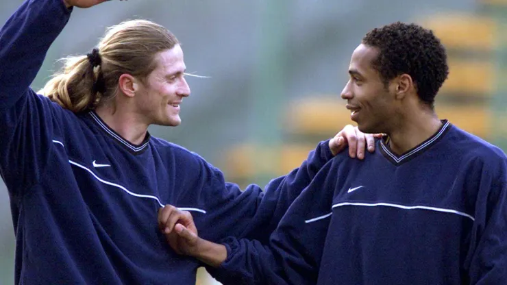Thierry Henry (R) and French team mate Emmanuel Petit at Arsenal train in Lens April 19 before their UEFA Cup semifinal match tomorrow. – RTXJMSU