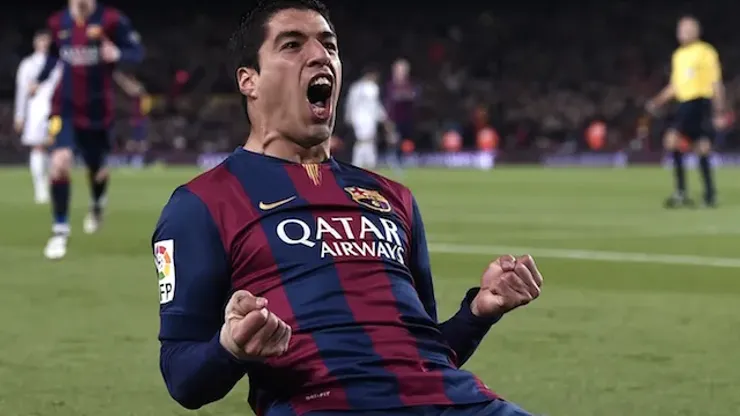 Barcelona's Uruguayan forward Luis Suarez celebrates his goal during the "clasico" Spanish league football match FC Barcelona vs Real Madrid CF at the Camp Nou stadium in Barcelona on March 22, 2015. AFP PHOTO / JOSEP LAGO (Photo credit should read JOSEP LAGO/AFP/Getty Images)