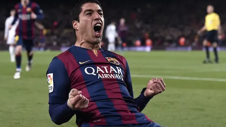Barcelona's Uruguayan forward Luis Suarez celebrates his goal during the "clasico" Spanish league football match FC Barcelona vs Real Madrid CF at the Camp Nou stadium in Barcelona on March 22, 2015. AFP PHOTO / JOSEP LAGO (Photo credit should read JOSEP LAGO/AFP/Getty Images)

