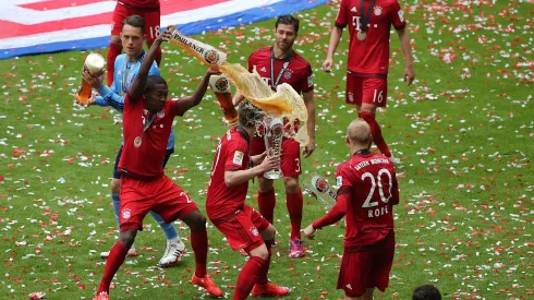 Bayern Munich celebrate Bundesliga title with beer soaking