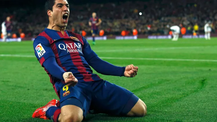 Barcelona's Luis Suarez celebrates after scoring a goal against Real Madrid during their Spanish first division "Clasico" soccer match at Camp Nou stadium in Barcelona, March 22, 2015. REUTERS/Albert Gea