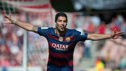 Suarez hat-trick fires Barca to La Liga title