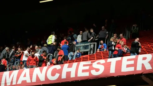 Football fans express anger on return to Old Trafford