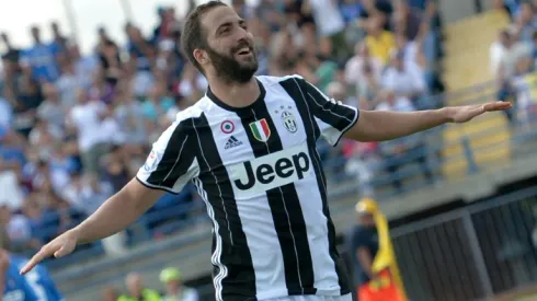 Juventus go four clear as Milan giants share tears and joy