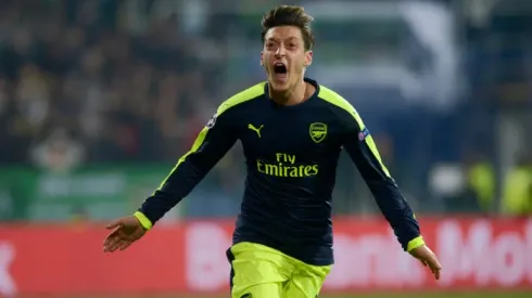 Arsenal through as Ozil crowns epic comeback