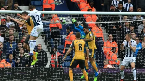 Dawson double darkens Wenger's Arsenal gloom