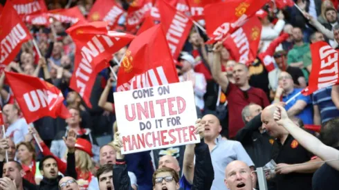 Man Utd fans celebrate triumph after tragedy