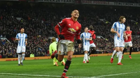 Sanchez opens account as United battle past Huddersfield