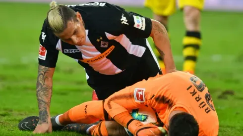 Pitch battle as Reus ends goal drought in Dortmund win