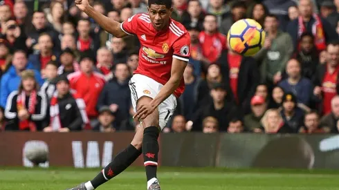 Rashford hits double as Man Utd hold off Liverpool