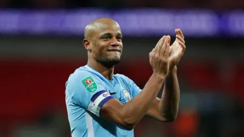 Kompany happy to keep Man City title champagne on ice