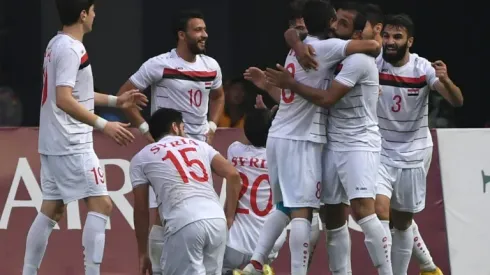 Syria take field in Asian Cup with fans divided by war