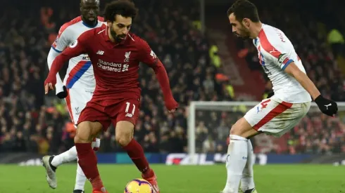 Salah fires Liverpool seven points clear, United extend winning run