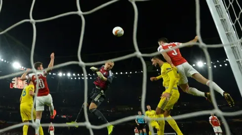 Arsenal thump BATE to reach Europa League last 16