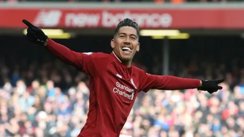 Firmino, Mane keep Liverpool in touch with Man City