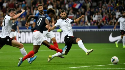 Coman brace helps France ease past Albania