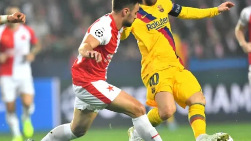 Messi's historic goal helps Barcelona edge Slavia Prague