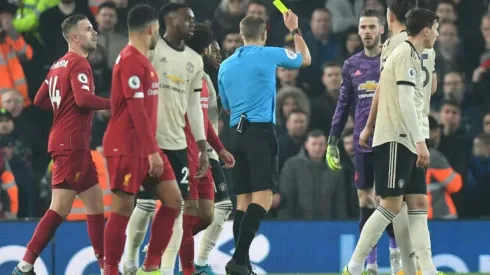United charged by FA over players' misconduct in Liverpool defeat