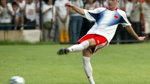 Legendary footballer in China's cross-hairs after 'overthrow' videos