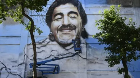 Street artist unveils mural to 'Saint' Diego Maradona