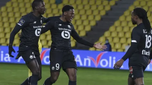 Lille reclaim top spot in Ligue 1 with David double