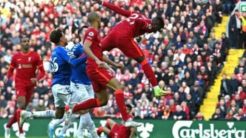 Liverpool overcome Everton battle to keep pressure on Man City